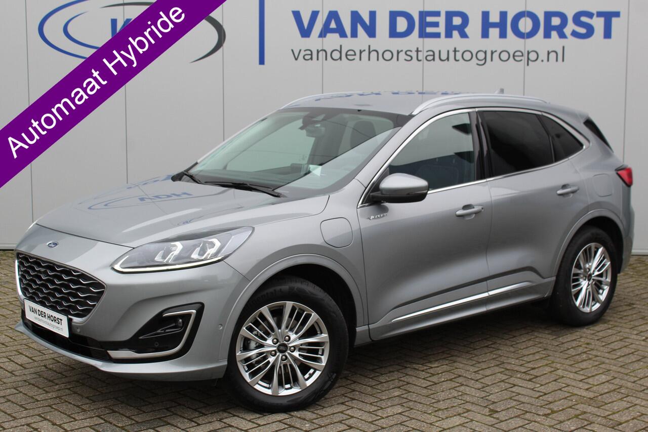 Ford KUGA 2.5-225pk PHEV Vignale Hybrid-AUTOMAAT ! Zeer chique verschijning, slechts 12.000km. Fabr. garantie t/m 07-02-2028 ! Volautm. airco dual, lane- en side assist, LED verl., lederen int., elektr. achterklep, elektr. trekhaak, camera v+a, stoel-, stuur- en vo