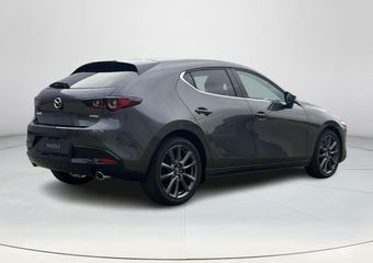 Mazda 3 2.5 e-SkyActiv-G M Hybrid 140 Takumi | Leder | Bose | Stoel/stuurverwarming | Adaptief cruise control | Elektrische verstelbare stoelen met geheugen | Achteruitrijcamera | Head-up display |