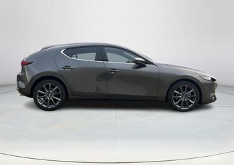 Mazda 3 2.5 e-SkyActiv-G M Hybrid 140 Takumi | Leder | Bose | Stoel/stuurverwarming | Adaptief cruise control | Elektrische verstelbare stoelen met geheugen | Achteruitrijcamera | Head-up display |