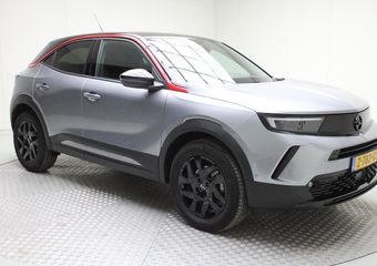 Opel MOKKA Electric Level 4 50 kWh | NL-auto | climate | pdc v/a+ camera | navi | carplay | dode hoek | cruise | bluetooth | spiegels elec. inklapbaar | keyless | stoel/stuur verwarming