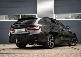 BMW 3-SERIE Touring 320e |Panorama dak | Trekhaak |Adapt. Cruise controle |